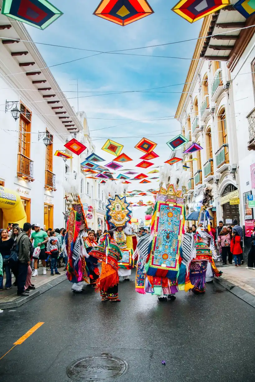 Colorful cultural parade on an Ecuador city street